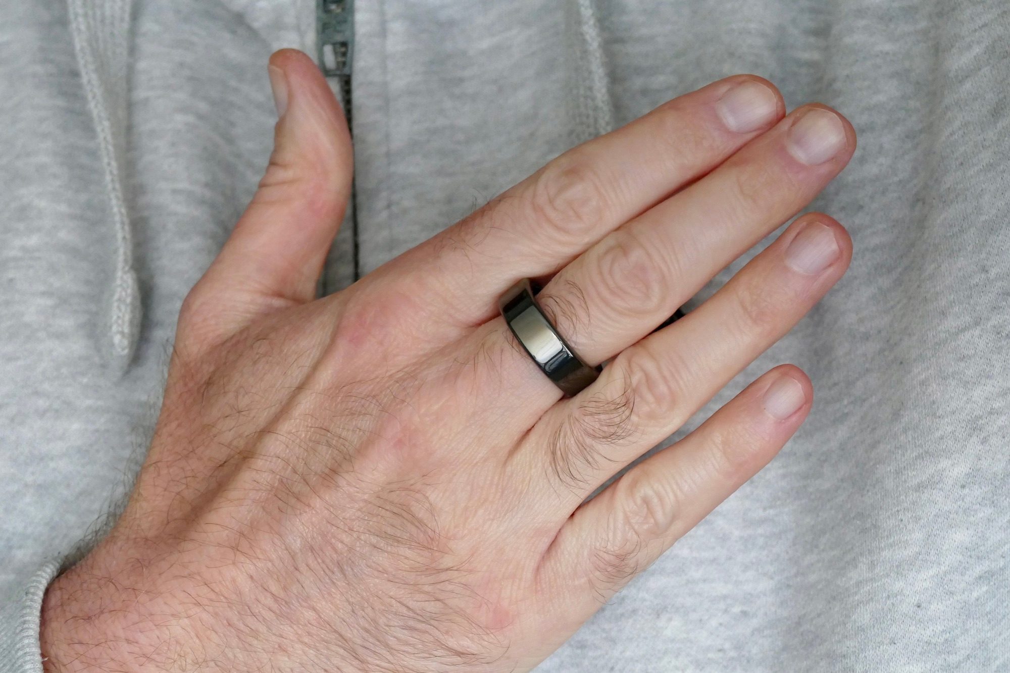 Sleek black smart health ring tracking sleep, HRV, and recovery